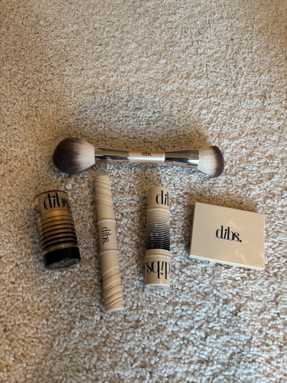 dibs. Double-Ended Brush, eyeshadow, contour blush stick, mascara, glow stick